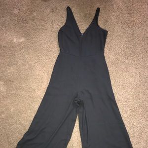 Deep cut jump suit